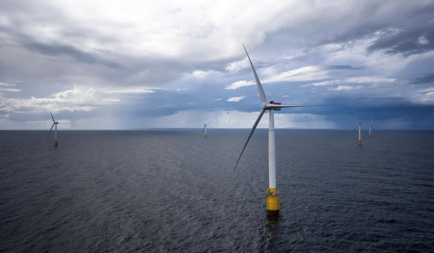 Hywind Scotland, the world&#x27;s first commercial wind farm using floating wind turbines, is visible off the coast of Scotland in August 2017. Tuesday, Dec. 6, 2022, marks the first-ever U.S. auction for leases to develop commercial-scale floating wind farms in the deep waters off the West Coast.  (Woldcam/Equinor via AP)