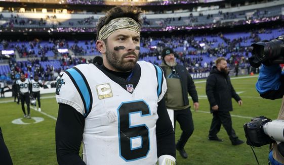 Carolina Panthers quarterback Baker Mayfield (6) walks off the field after his teams loss to the Baltimore Ravens after an NFL football game Sunday, Nov. 20, 2022, in Baltimore. A person familiar with the situation says the Carolina Panthers are expected to waive quarterback Baker Mayfield after the 2018 No. 1 draft pick asked for his release. The person spoke to The Associated Press on condition of anonymity because the announcement has not yet been made official. (AP Photo/Patrick Semansky, File) ** FILE**