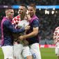 Croatia&#39;s Ivan Perisic, second left, celebrates with teammates after scoring his side&#39;s opening goal during the World Cup round of 16 soccer match between Japan and Croatia at the Al Janoub Stadium in Al Wakrah, Qatar, Monday, Dec. 5, 2022. (AP Photo/Thanassis Stavrakis)