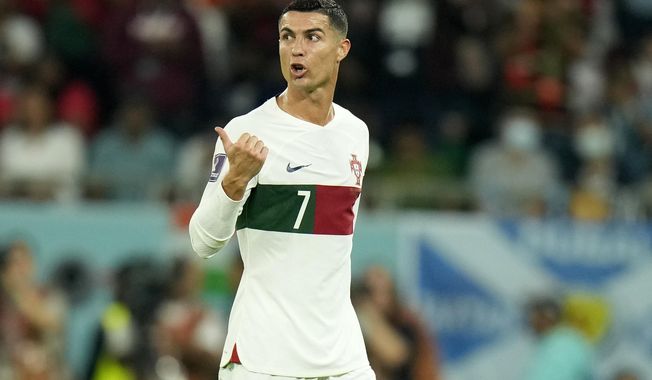 Portugal's Cristiano Ronaldo leaves the pitch after being substituted during the World Cup group H soccer match between South Korea and Portugal, at the Education City Stadium in Al Rayyan , Qatar, Friday, Dec. 2, 2022. (AP Photo/Francisco Seco)