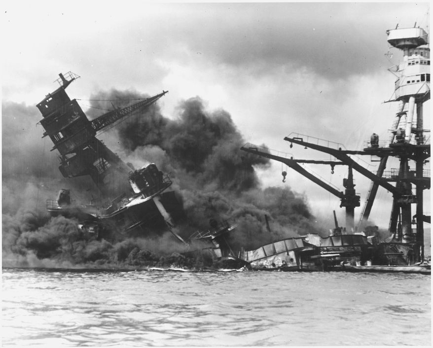 A U.S Navy photograph documenting the Japanese attack on Pearl Harbor, Hawaii which initiated US participation in World War II. Navy&#x27;s caption: The battleship USS Arizona is sinking after being hit by Japanese air attack on Dec. 7,1941. (U.S. Navy)