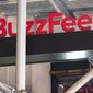 The entrance to BuzzFeed in New York is seen on Nov. 19, 2020. BuzzFeed is cutting 12% of its workforce, citing worsening economic conditions. (AP Photo/Ted Shaffrey, File)