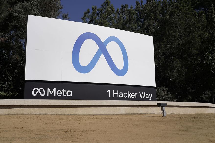 FILE - Facebook&#x27;s Meta logo sign is seen at the company headquarters in Menlo Park, Calif., on, Oct. 28, 2021. Facebook parent Meta&#x27;s quasi-independent oversight board said Tuesday, Dev. 6, 2022 that an internal system that exempted high-profile users including former President Donald Trump from some or all of its content rules needs a major overhaul. (AP Photo/Tony Avelar, File)