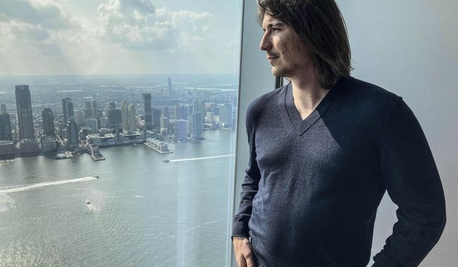 Robinhood CEO Vlad Tenev poses for a picture during an interview on July 28, 2021, in New York. After blazing onto Wall Street by making trading fun for its customers, Robinhood is now setting its sights on a more staid corner of the industry: saving for retirement. On Tuesday, Dec. 6, 2022, the company is opening up signups for a retirement program, where customers can sock savings into an Individual Retirement Account, something better known as an IRA. (AP Photo/David R. Martin, File)