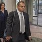 Ramesh &quot;Sunny&quot; Balwani, right, the former lover and business partner of Theranos CEO Elizabeth Holmes, walks into federal court in San Jose, Calif., on June 24, 2022. Balwani learns Wednesday, Dec. 7, 2022, whether he will be punished as severely as Holmes for peddling the company&#x27;s bogus blood-testing technology that duped investors and endangered patients. (AP Photo/Michael Liedtke, File)