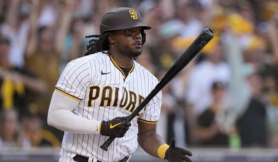 San Diego Padres&#39; Josh Bell watches hit RBI-single during the fifth inning in Game 2 of the baseball NL Championship Series between the San Diego Padres and the Philadelphia Phillies on Oct. 19, 2022, in San Diego. The Cleveland Guardians and slugging first baseman Bell have agreed to a $33 million, two-year contract, according to a person familiar with the negotiations. The person spoke to The Associated Press on Tuesday, Dec. 6, 2022, on condition of anonymity because the deal was pending a review of medical records. (AP Photo/Brynn Anderson, File) **FILE**