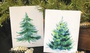 This image provided by Judy A. Steiner shows handmade watercolor Christmas tree cards. Handmade holiday cards can be gifts in themselves for both maker and receiver. They&#39;re a way to express creativity and connection. And gathering to make them can be a nice social activity. (Judy A. Steiner via AP)