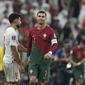 Portugal&#39;s Cristiano Ronaldo walks during the World Cup round of 16 soccer match between Portugal and Switzerland, at the Lusail Stadium in Lusail, Qatar, Tuesday, Dec. 6, 2022. (AP Photo/Alessandra Tarantino)