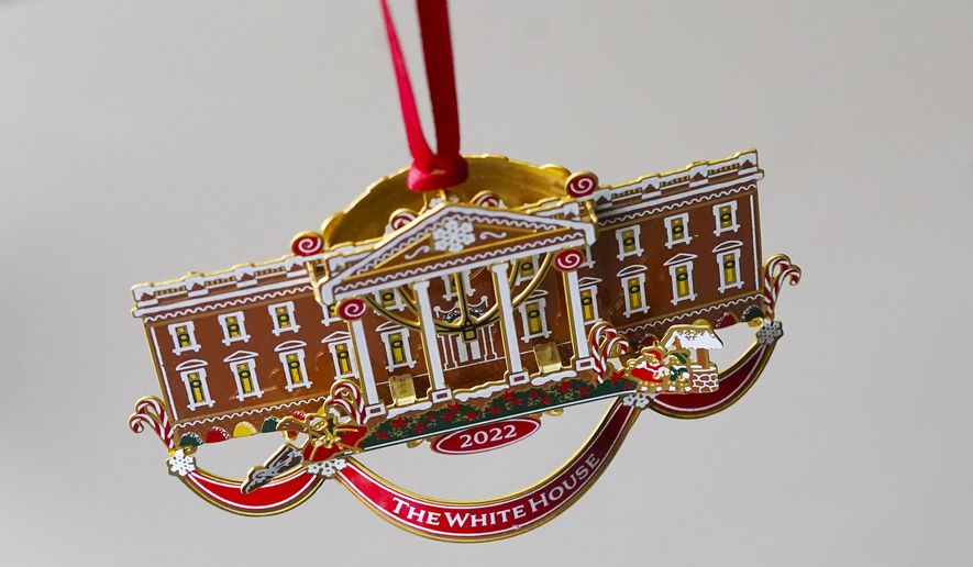 The White House Historical Association&#39;s 2022 Christmas Ornament, Tuesday, Dec 6, 2022 in Washington. The annual tree ornament is honors President Richard M. Nixon&#39;s administration and a nod to first lady Pat Nixon who first put a gingerbread house on display in the State Dining Room for the holiday season at the White House, long before its talented pastry chefs began making hundred-pound replicas of the executive mansion. (AP Photo/Pablo Martinez Monsivais)