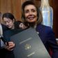 House Speaker Nancy Pelosi of Calif., leaves after signing H.R. 8404, the Respect For Marriage Act, on Capitol Hill in Washington, Thursday, Dec. 8, 2022. (AP Photo/Andrew Harnik)