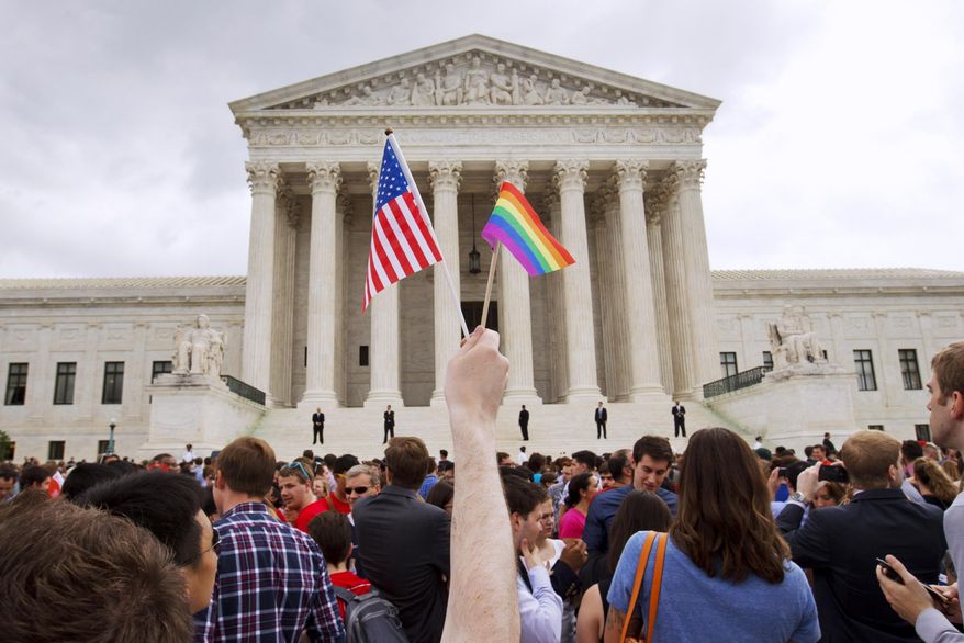 The crowd celebrates outside of the Supreme Court in Washington on June 26, 2015, after the court declared that same-sex couples have a right to marry anywhere in the US. (AP Photo/Jacquelyn Martin) **FILE**