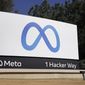 Facebook&#39;s Meta logo sign is seen at the company headquarters in Menlo Park, Calif. on Oct. 28, 2021. (AP Photo/Tony Avelar, File)