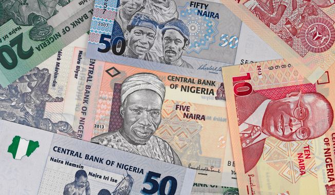 Nigeria’s push for a cashless society is taking another step as Africa’s most populous country will soon limit the amount of money citizens can withdraw each day. (File photo credit: vkilikov via Shutterstock)