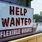A help wanted sign is displayed in Deerfield, Ill., Wednesday, Sept. 21, 2022. The Labor Department reports on Thursday the number of people who applied for unemployment benefits last week. (AP Photo/Nam Y. Huh, File)
