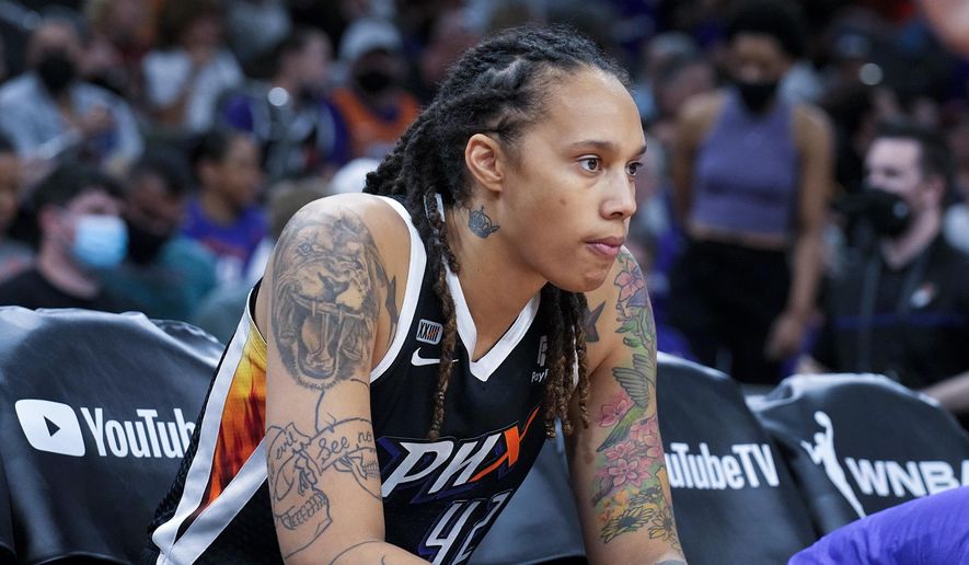 Phoenix Mercury center Brittney Griner sits during the first half of Game 2 of basketball&#x27;s WNBA Finals against the Chicago Sky, Wednesday, Oct. 13, 2021, in Phoenix. Russia has freed WNBA star Brittney Griner in a dramatic high-level prisoner exchange, with the U.S. releasing notorious Russian arms dealer Viktor Bout. (AP Photo/Rick Scuteri, File) **FILE**