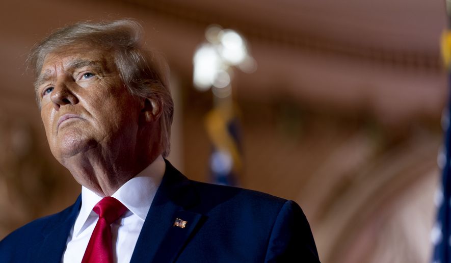 Former President Donald Trump announces he is running for president for the third time as he pauses while speaking at Mar-a-Lago in Palm Beach, Fla., Nov. 15, 2022. Lawyers for Donald Trump were in court Friday, Dec. 9, for sealed arguments as part of the ongoing investigation into the presence of classified information at the former president&#x27;s Florida estate. (AP Photo/Andrew Harnik, File)