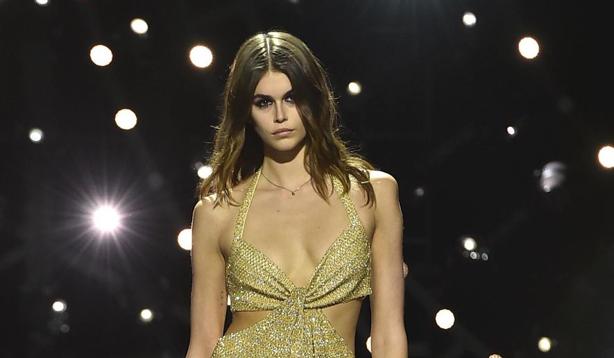 Model Kaia Gerber walks the runway at the Celine Fall/Winter 2023 Fashion Show on Thursday, Dec. 8, 2022, at The Wiltern in Los Angeles. (Photo by Jordan Strauss/Invision/AP)