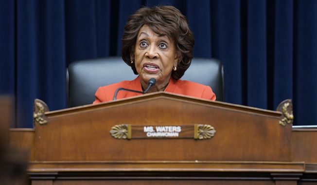 Committee Chairman Rep. Maxine Waters, D-Calif., speaks during a House Committee on Financial Services hearing, Wednesday, April 6, 2022, on Capitol Hill in Washington, with Treasury Secretary Janet Yellen. The former CEO of the failed cryptocurrency exchange FTX said in a tweet Friday, Dec. 9, that he is willing to testify to Congress next week, but that he will be limited in what he can say and that he “won&#x27;t be as helpful” as he’d like to be. The tweet came in response to a tweet from Waters, who on Monday requested that Bankman-Fried attend next week’s hearings over the collapse of FTX. (AP Photo/Evan Vucci) **FILE**