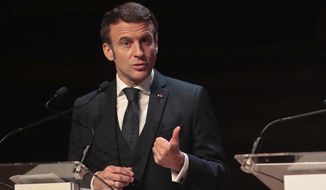 French President Emmanuel Macron speaks during the H2Med summit in Alicante, Spain, Friday Dec. 9, 2022. The H2Mad summit is to discuss a plan for an undersea pipeline that would eventually transport hydrogen and will connect the ports of Barcelona in Spain and Marseille in France. (AP Photo/J.M Fernandez)