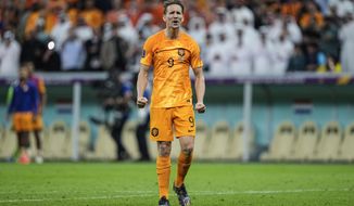 Luuk de Jong of the Netherlands celebrates after scoring a penalty kick during the World Cup quarterfinal soccer match between the Netherlands and Argentina, at the Lusail Stadium in Lusail, Qatar, Saturday Dec. 10, 2022. (AP Photo/Jorge Saenz)