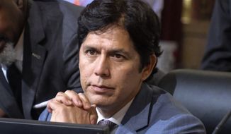 Los Angeles City Council member Kevin de Leon sits in chamber before starting the Los Angeles City Council meeting on Oct. 11, 2022 in Los Angeles. Leon was involved in a fight with an activist at a holiday event Friday night, Dec. 9. The altercation involving Leon occurred at a toy giveaway and holiday tree lighting at Lincoln Park, the Los Angeles Times reported. (AP Photo/Ringo H.W. Chiu, File)