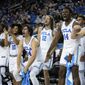 UCLA team members celebrate from the bench after forward Adem Bona scored during the second half of an NCAA college basketball game against Denver Saturday, Dec. 10, 2022, in Los Angeles. (AP Photo/Mark J. Terrill) **FILE**