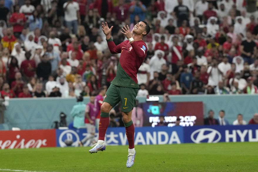 Portugal&#x27;s Cristiano Ronaldo reacts after missing a scoring chance during the World Cup round of 16 soccer match between Portugal and Switzerland, at the Lusail Stadium in Lusail, Qatar, Tuesday, Dec. 6, 2022. (AP Photo/Alessandra Tarantino)