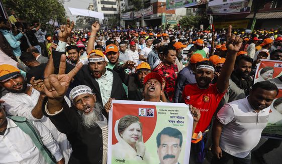 Supporters of Bangladesh Nationalist Party, headed by former Prime Minister Khaleda Zia, shout slogans during a rally in Dhaka, Bangladesh, Saturday, Dec. 10, 2022. Tens of thousands of opposition supporters rallied in Bangladesh&#39;s capital on Saturday to demand the government of Prime Minister Sheikh Hasina resign and install a caretaker before next general elections expected to be held in early 2024. (AP Photo/Mahmud Hossain Opu)