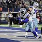 Dallas Cowboys running back Ezekiel Elliott (21) scores a touchdown during the second half of an NFL football game against the Houston Texans, Sunday, Dec. 11, 2022, in Arlington, Texas. (AP Photo/Michael Ainsworth)