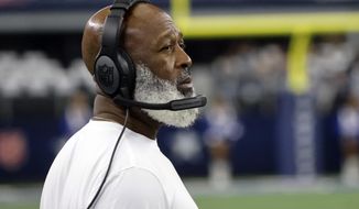 Houston Texans head coach Lovie Smith looks on from the sideline during the first half of an NFL football game against the Dallas Cowboys, Sunday, Dec. 11, 2022, in Arlington, Texas. (AP Photo/Michael Ainsworth)