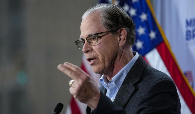 U.S. Sen. Mike Braun, R-Ind., announces in Indianapolis, Monday, Dec. 12, 2022, that he will run for Indiana governor in 2024. Braun will face Indiana Lt. Gov. Suzanne Crouch for the Republican nomination. (AP Photo/Michael Conroy)