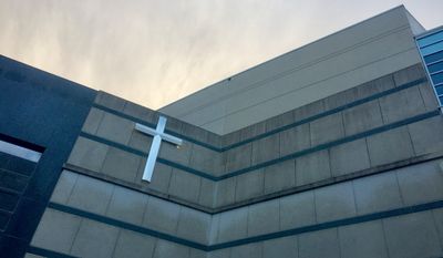 Vienna, Virginia - January 25, 2020: Early morning sunlight paints the clouds above McLean Bible Church, a megachurch in the Northern Virginia suburbs near Washington, D.C. File photo credit: John M. Chase via Shutterstock.