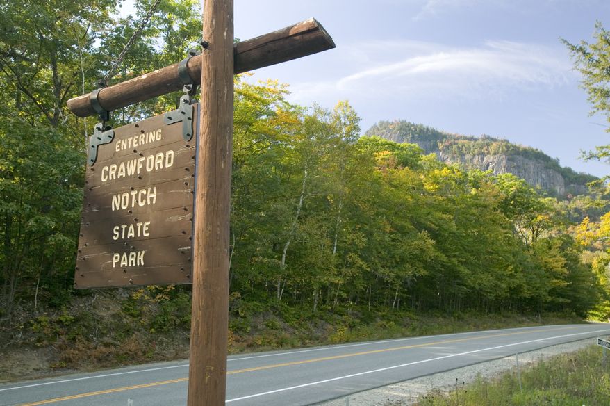Sign reads Entering Crawford Notch State Park, New Hampshire. A hiker fell to his death Saturday while taking photos with his wife at the summit of Mount Willard in Crawford Notch, according to authorities. File photo credit: Joseph Sohm via Shutterstock.