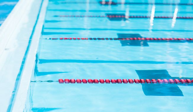 Competetive swimming pool lanes. The Supreme Court declined Monday to hear a gender equality case over Michigan State University cutting its swimming and diving program for women. File photo credit: Arina P Habich via Shutterstock.
