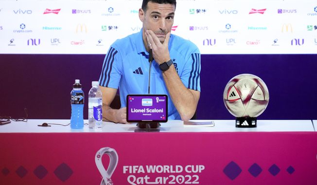 Argentina&#x27;s head coach Lionel Scaloni attends a press conference ahead of the semifinal soccer match between Argentina and Croatia in Doha, Monday, Dec. 12, 2022. (AP Photo/Natacha Pisarenko)