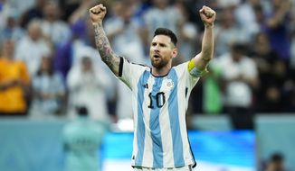 Argentina&#39;s Lionel Messi celebrates after scoring Argentina&#39;s second goal during the World Cup quarterfinal soccer match between the Netherlands and Argentina, at the Lusail Stadium in Lusail, Qatar, Friday, Dec. 9, 2022. (AP Photo/Francisco Seco)