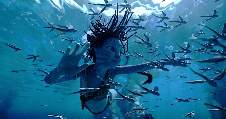 This image released by 20th Century Studios shows Trinity Bliss, as Tuk, in a scene from "Avatar: The Way of Water." (20th Century Studios via AP)