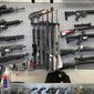 Firearms are displayed at a gun shop in Salem, Ore., on Feb. 19, 2021. An Oregon judge on Tuesday, Dec. 13, 2022, extended an earlier order blocking a key part of a new, voter-approved gun law and was hearing lengthy arguments on whether to also prevent the law&#39;s ban on high-capacity magazines from taking effect.  (AP Photo/Andrew Selsky, File)