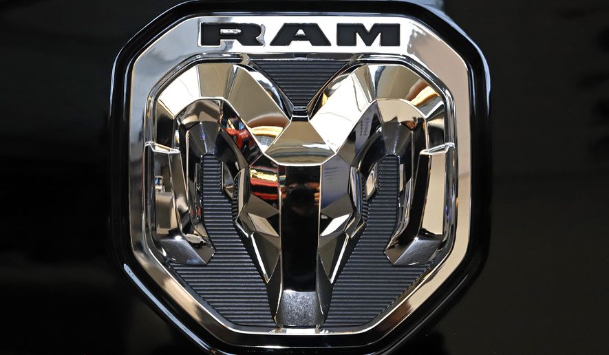 This is the 2020 Ram truck logo on display at the 2020 Pittsburgh International Auto Show Thursday, Feb.13, 2020 in Pittsburgh. Stellantis is recalling nearly 250,000 heavy duty diesel Ram trucks in the U.S., Thursday, Nov. 17, 2022 because transmission fluid can leak and cause engine fires. The recall covers certain 2020 to 2023 Ram 2500 and some 2020 through 2022 Ram 3500 trucks.   (AP Photo/Gene J. Puskar, File)