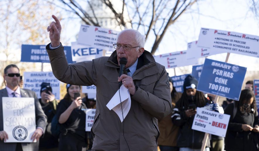 Sen. Bernie Sanders, I-Vt., speaks during a rail union workers rally near U.S. Capitol in Washington, Tuesday, Dec. 13, 2022. (AP Photo/Jose Luis Magana)