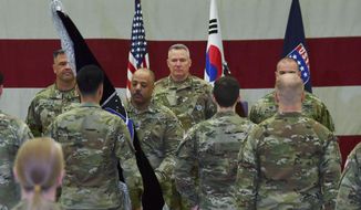Gen. Paul J. LaCamera, center, commander of the U.S. Forces Korea attends the activation ceremony for the United States Space Forces Korea in Pyeongtaek, South Korea Wednesday, Dec. 14, 2022. U.S. military set up space-monitoring organizations, United States Space Forces Korea, in South Korea, aiming to keep an eye on North Korea&#39;s nuclear and missile activity as its capabilities continue to improve. (Song Kyung-Seok/Pool Photo via AP)