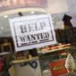 A help wanted sign is shown in a storefront on Nov. 1, 2022, in Bedford, N.Y. The Federal Reserve&#39;s move Wednesday, Dec. 14, to raise its key rate by a half-point brought it to a range of 4.25% to 4.5%, the highest level in 14 years. (AP Photo/Julia Nikhinson, File) **FILE**