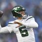 New York Jets quarterback Mike White winds up to pass while warming up prior to an NFL football game against the Buffalo Bills, Sunday, Dec. 11, 2022, in Orchard Park, N.Y. (AP Photo/Adrian Kraus)