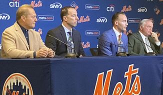 Agent Scott Boras, from left, New York Mets general manager Billy Eppler, Mets center fielder Brandon Nimmo and Mets manager Buck Showalter attend a baseball press conference to announce Nimmo&#39;s $162 million, eight-year contract, Thursday, Dec. 15, 2022, at Citi Field in New York. (AP Photo/Ron Blum)