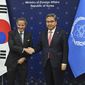 Director General of the International Atomic Energy Agency, IAEA, Rafael Grossi, left, is greeted by South Korean Foreign Minister Park Jin at the Foreign Ministry in Seoul, Thursday, Dec. 15, 2022. (Jung Yeon-je/Pool Photo via AP)