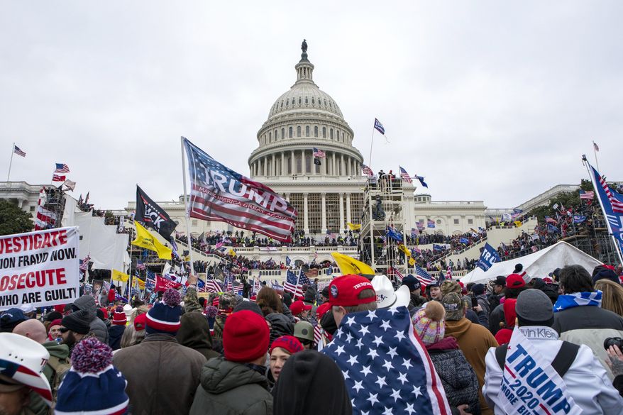 Rioters loyal to President Donald Trump rally at the U.S. Capitol in Washington on Jan. 6, 2021. (AP Photo/Jose Luis Magana) **FILE**
