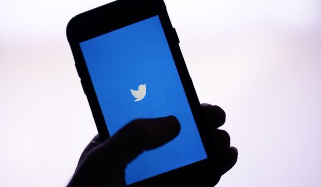 The Twitter application is seen on a digital device Monday, April 25, 2022, in San Diego. (AP Photo/Gregory Bull, File)