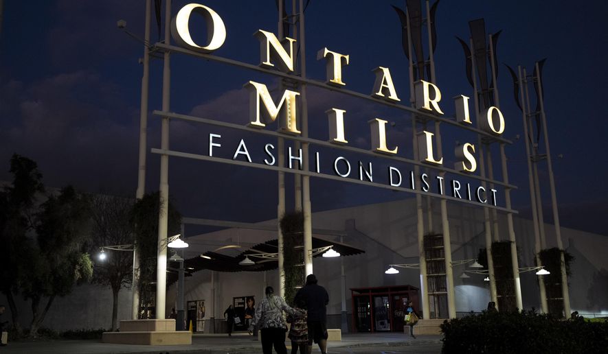 Shoppers enter the Ontario Mills shopping center in Ontario, Calif., Wednesday, Dec. 7, 2022. Voters in one of Southern California's largest counties have delivered a pointed if largely symbolic message about frustration in the nation's most populous state: Officials will soon begin studying whether to break free from California and form a new state. (AP Photo/Jae C. Hong)