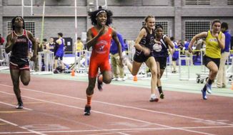 Bloomfield High School transgender athlete Terry Miller, second from left, wins the final of the 55-meter dash over transgender athlete Andraya Yearwood, far left, and other runners in the Connecticut girls Class S indoor track meet at Hillhouse High School, on Feb. 7, 2019, in New Haven, Conn. A federal appeals court on Friday, Dec. 16, 2022,  dismissed a challenge to Connecticut&#39;s policy of allowing transgender girls to compete girls&#39; high school sports, rejecting arguments by four cisgender runners who said they were unfairly forced to race against transgender athletes. (AP Photo/Pat Eaton-Robb, File)