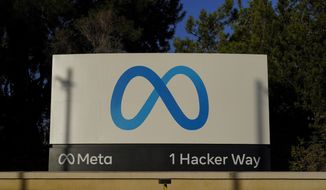 Meta&#39;s logo can be seen on a sign at the company&#39;s headquarters in Menlo Park, Calif., on Nov. 9, 2022. (AP Photo/Godofredo A. Vásquez, File)